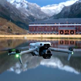 DJI drone beside a mountain lake