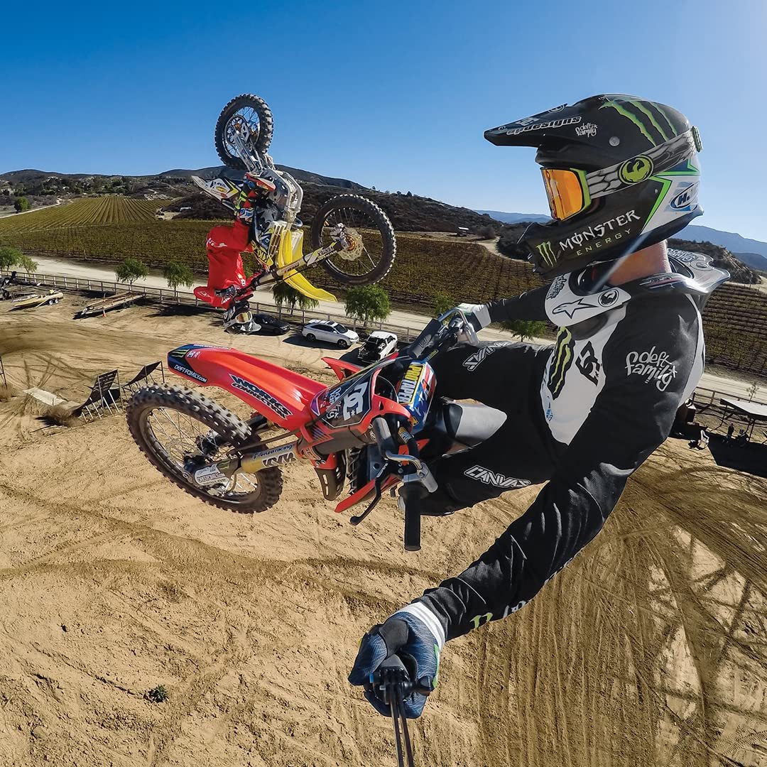 bike flying from the hill and racer shoot the video from GoPro HERO10 Black